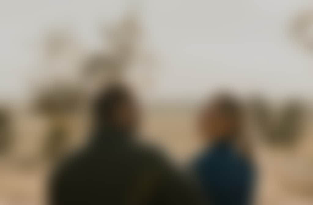 Redlands Couple Looking out landscape