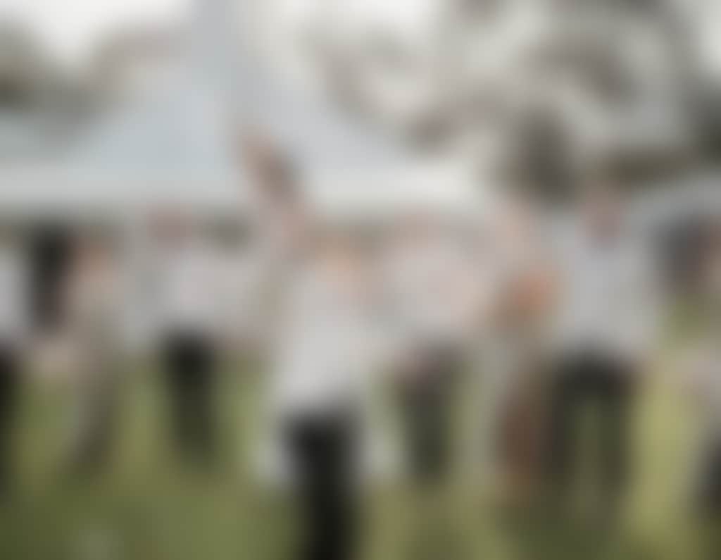 St Leonards Rutherglen outdoor wedding group with wine