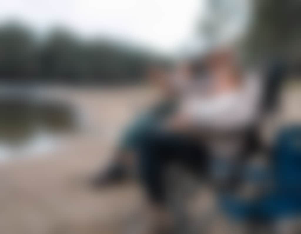Winter family in chairs by river