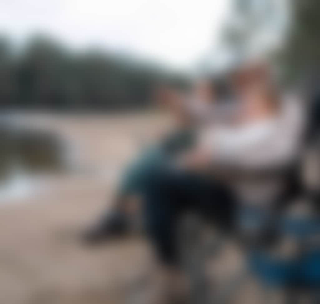 Winter family in chairs by river